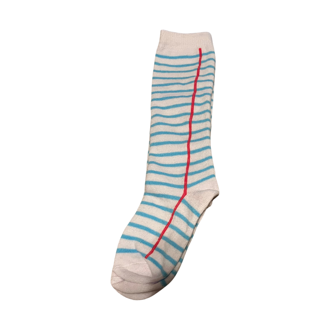 Girls knee-high socks with notebook paper design featuring blue lines and red margin, perfect for school outfits or back-to-school style. notebook knee high socks, notebook paper knee high socks