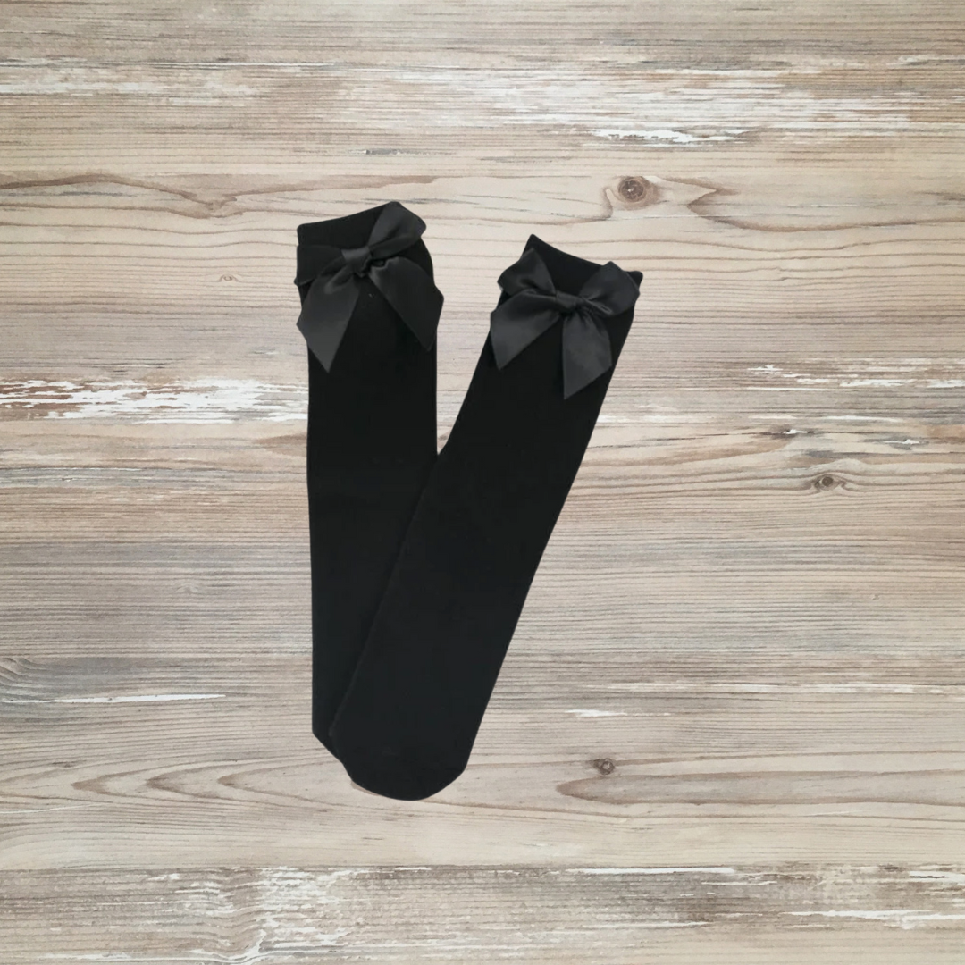 black knee-high girls socks with large satin bows, breathable cotton blend, stretchy fit, ideal for toddlers and kids, dressy or casual wear