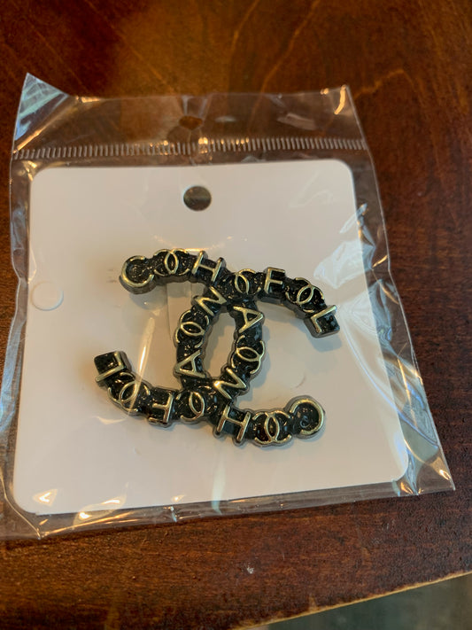 Noir Lettered Emblem Brooch