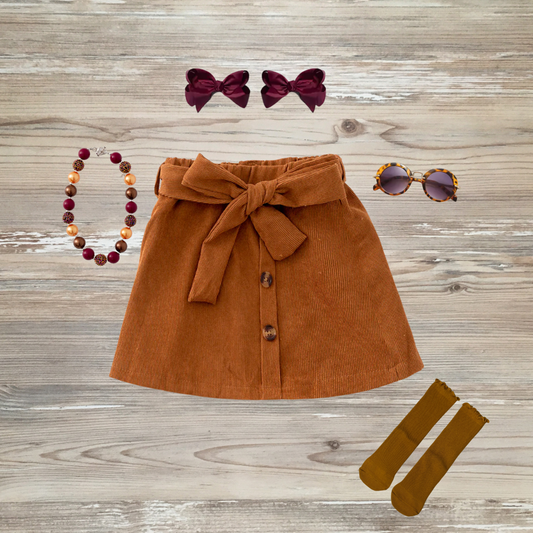 Pumpkin spice corduroy A-line skirt with front buttons and a bow tie waistband for toddler girls, kids online boutique clothing, corduroy skirt for girls, girls boutique clothing