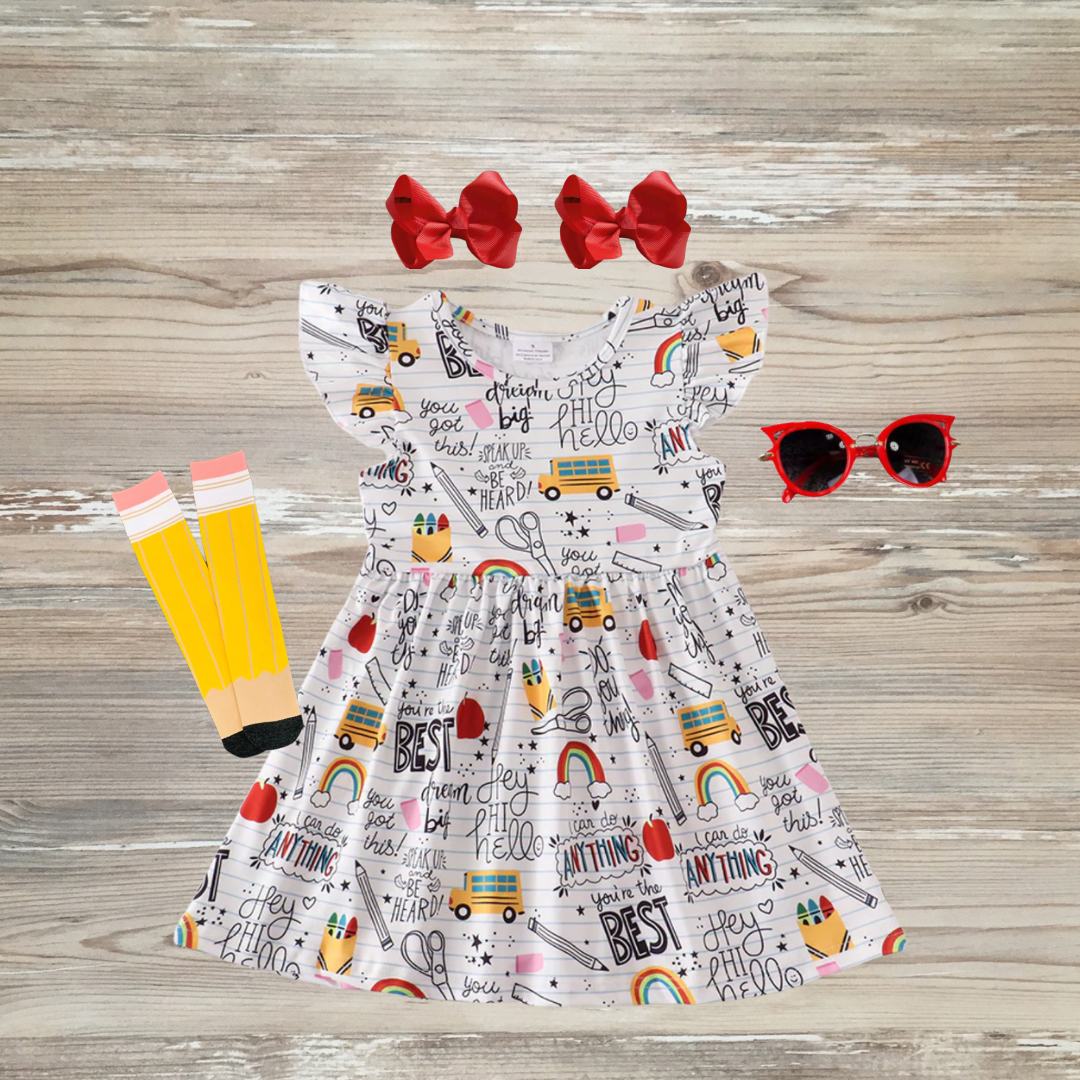 back to school dress, school print dress, back to school clothing, back to school girls cute clothes and dresses, doodle dress, back to school outfit back to school dress, school print dress, back to school clothing, back to school girls cute clothes and dresses, kids with disabilities, cerebral palsy awareness, Girls back-to-school twirl dress featuring colorful school-themed doodles with apples, rainbows, pencils, buses, and motivational words, online kids boutique clothing