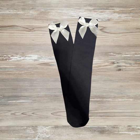 girls Black and white knee-high socks with white bows, classic girls boutique bow socks, 
Elegant balck and white knee-high socks for girls with satin bows, soft cotton fabric, secure fit, perfect for toddlers and kids’ party, school, or daily outfits
balck & White knee-high girls socks with large satin bows, breathable cotton blend, stretchy fit, ideal for toddlers and kids, dressy or casual wear
