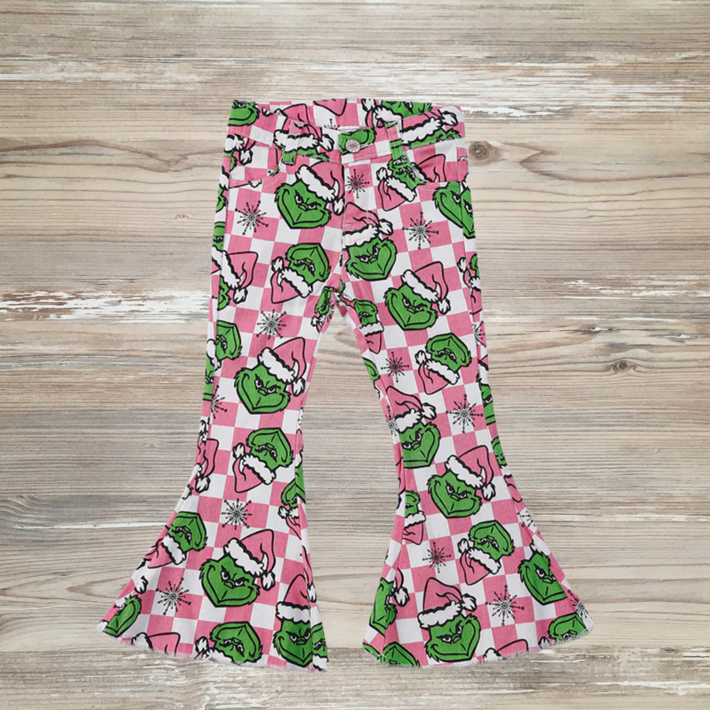 grinch jeans for girls kids online boutique grinch jeans, Christmas jeans for girls grinchmas jeans for girls, pink grinch jeans, trendy grinch clothing for girls and christmas, girls online boutique clothing